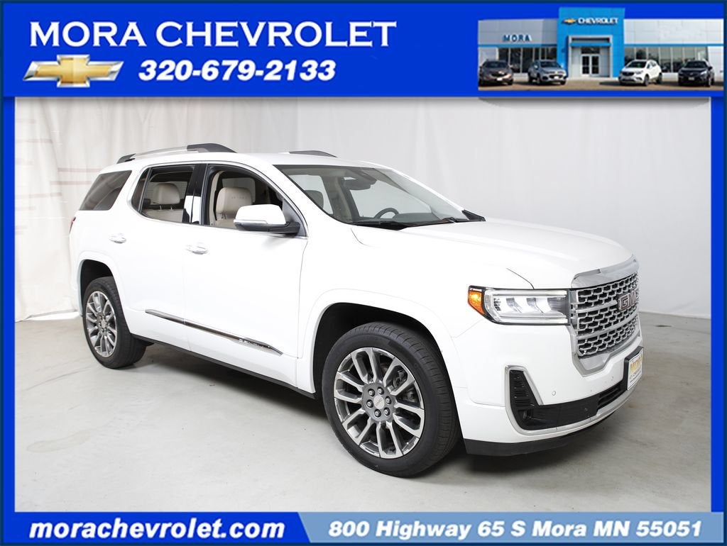 2023 GMC Acadia Denali in Summit White — front three-quarter view